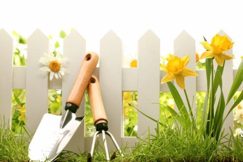 Gardener tending to flowers in Brixton garden